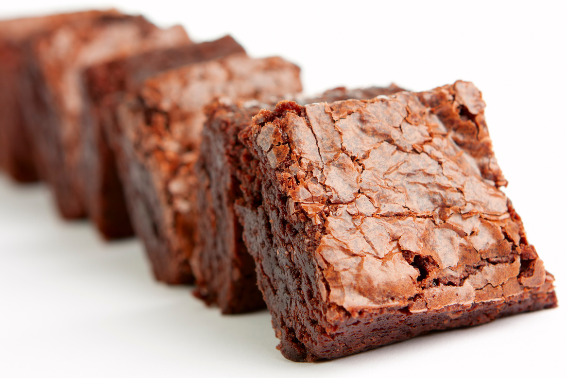 Freshly baked brownies portioned by the Tabletop Depositor
